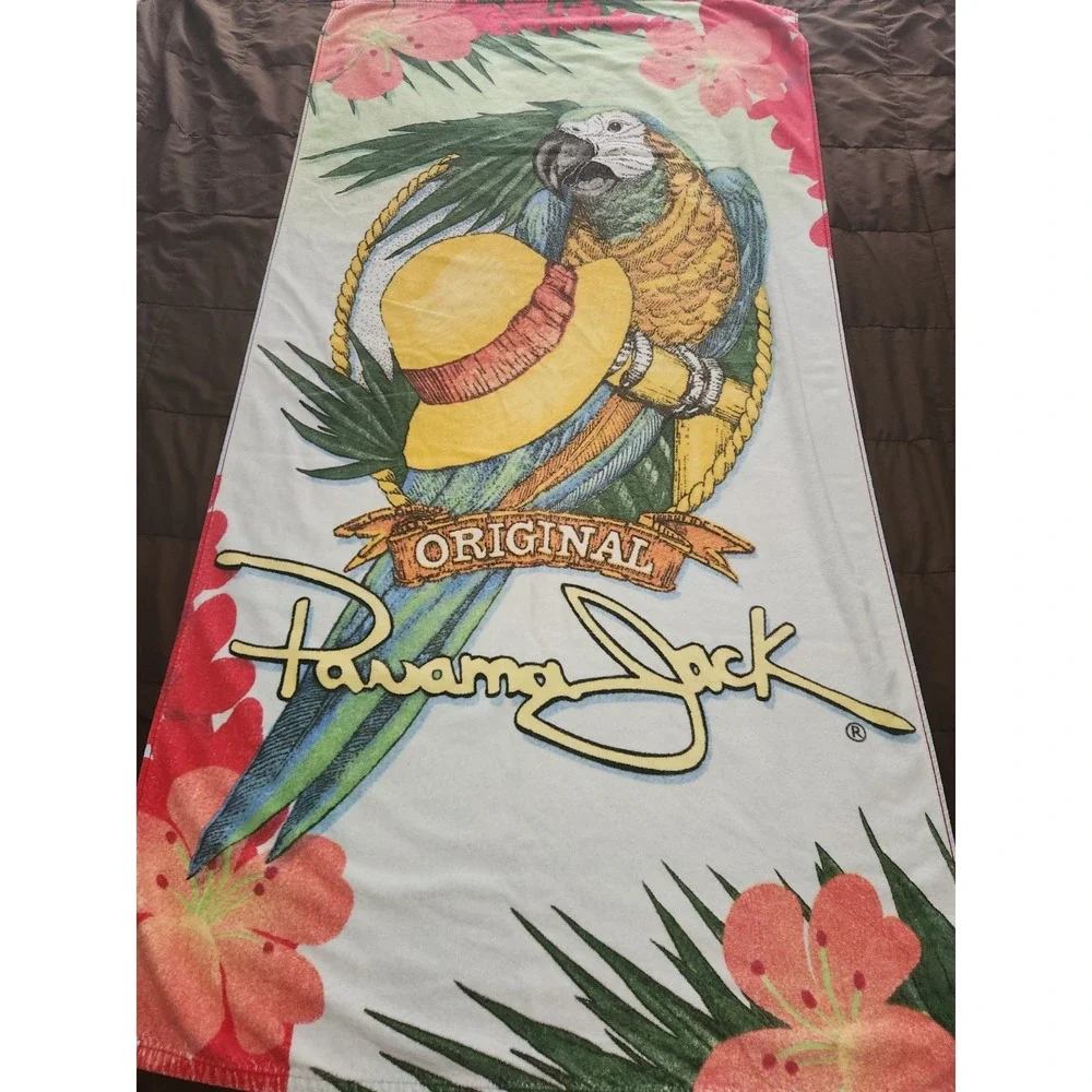 Vintage Panama Jack beach towel featuring a parrot and a straw hat 60 x 31